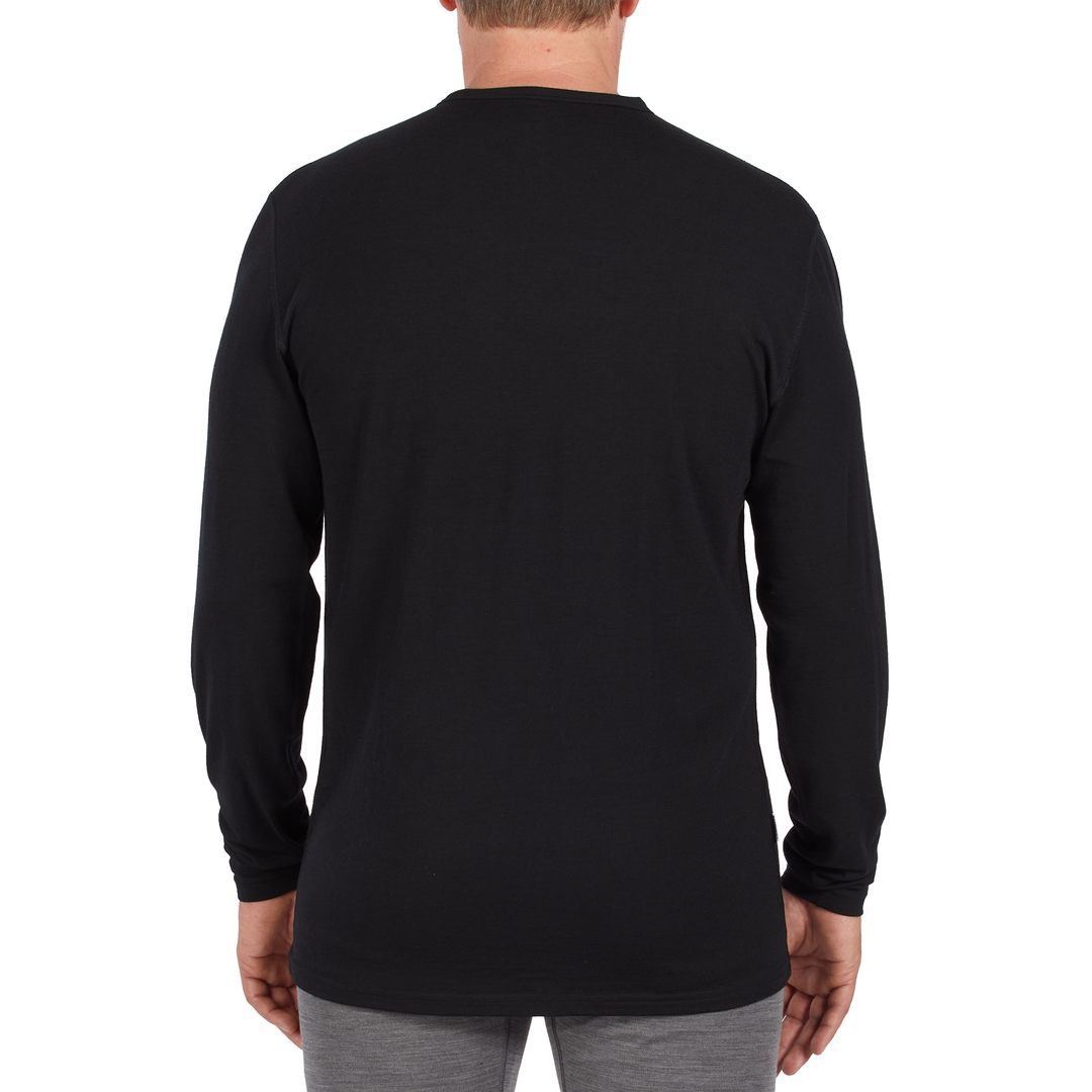 Man wearing a black microweight merino crew, back view 