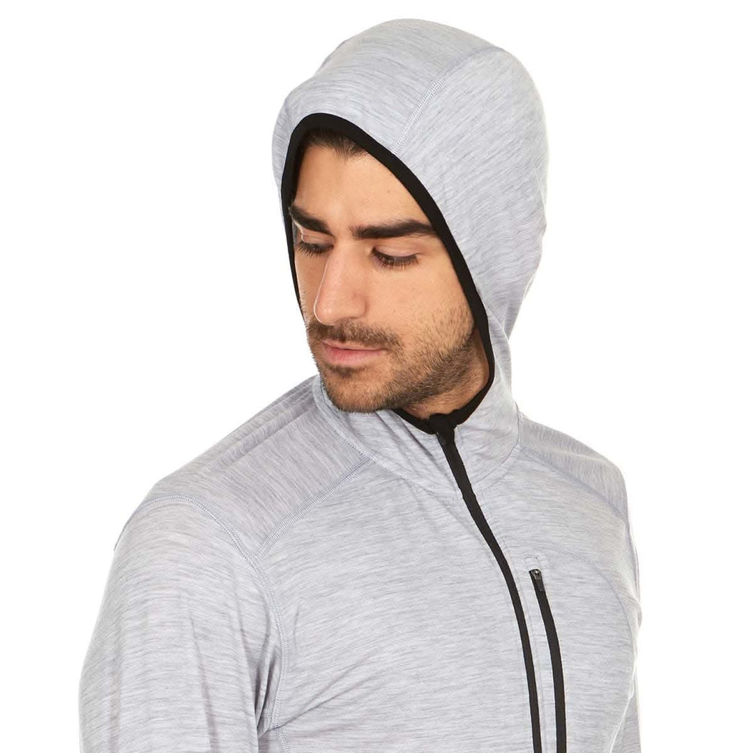 Front hood-up view of a male model wearing an ash gray microweight merino wool quarter-zip sun hoodie 