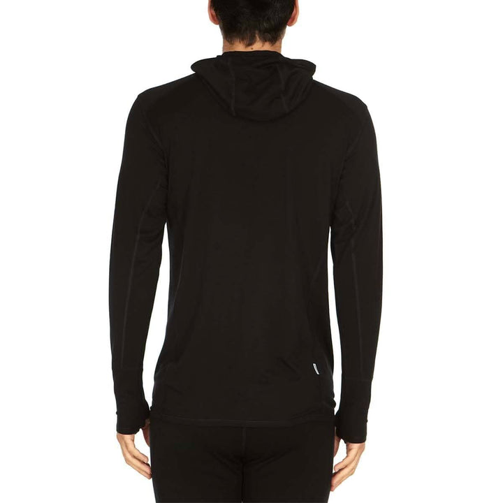 A man models the super light microweight merino wool quarter zip sun hoodie 