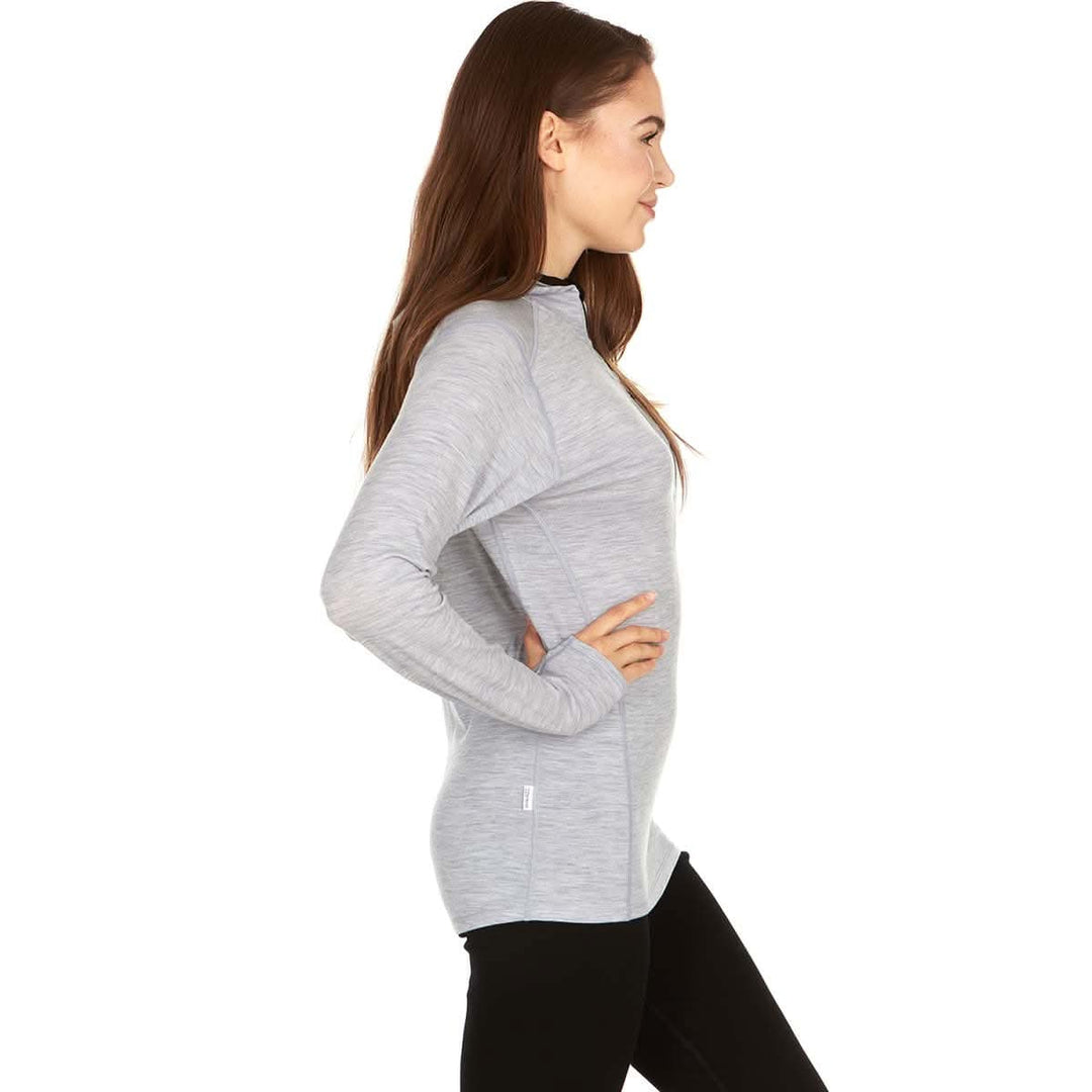 Womens super lightweight wool hoodie quarter zip merino wool outdoor top. Side view. 