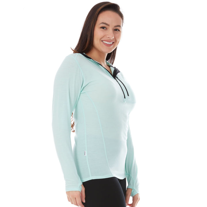 Womens super lightweight wool hoodie quarter zip merino wool outdoor top. Side view 3. 