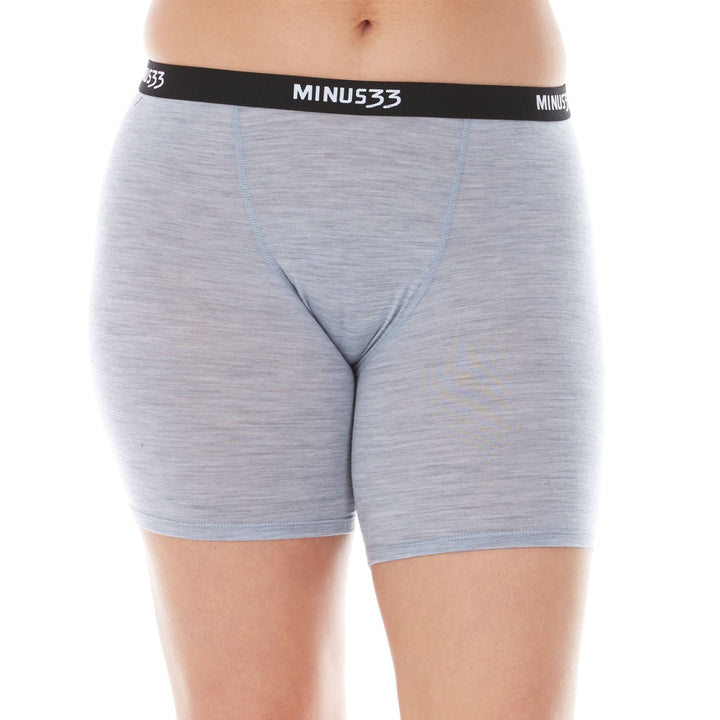 A woman models the microweight merino wool women&