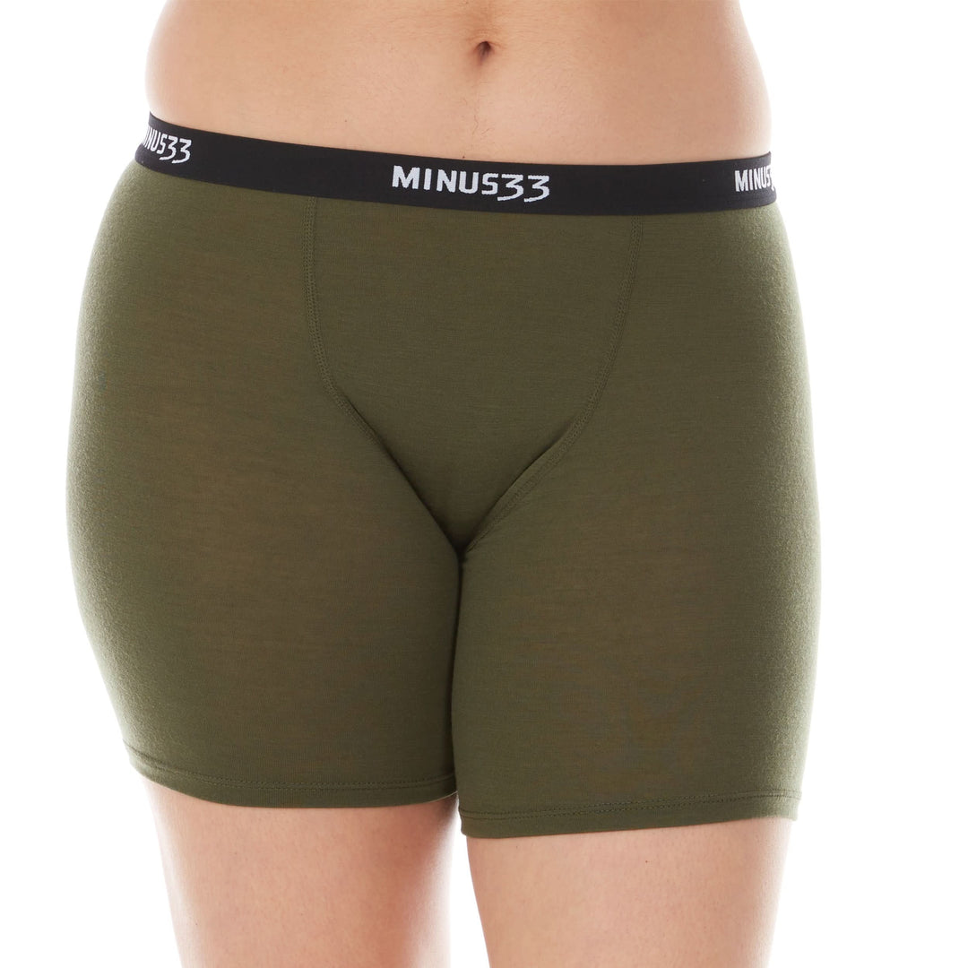 A woman models the microweight merino wool women&