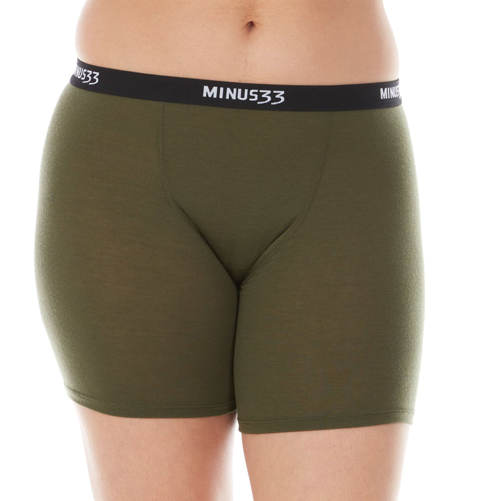 A woman models the microweight merino wool women&