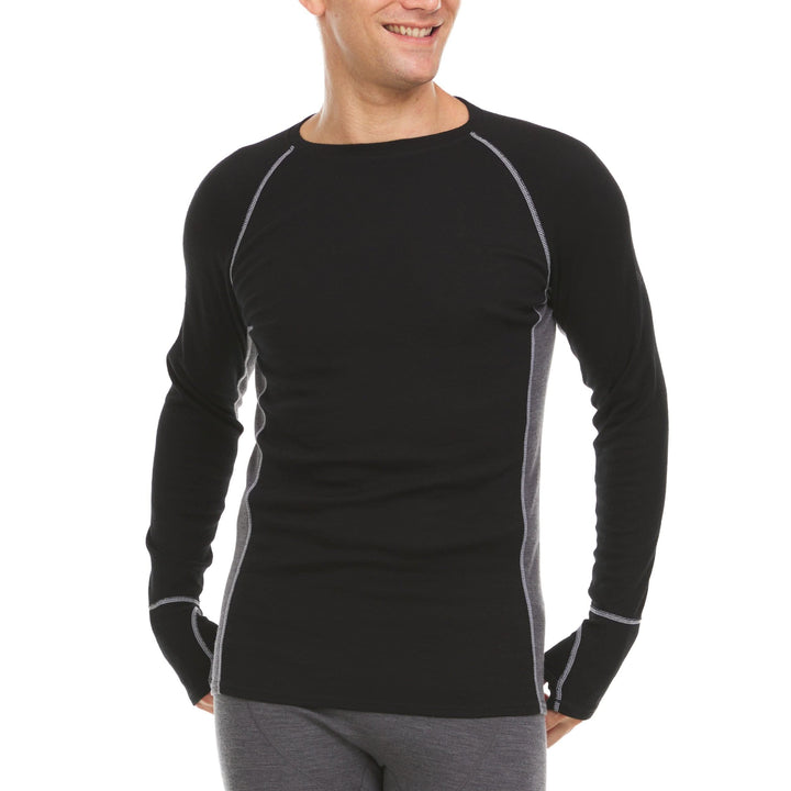 male model wearing midweight woolverino long sleeve crew. The Woolverino Midweight Crew gives you a slim-fitting top that moves with you. Yoked shoulders, side panels, and thumbholes keep your top in place. Our Woolverino core-spun blend adds extra durability while the amazing insulating power of merino wool keeps you warm and comfortable.