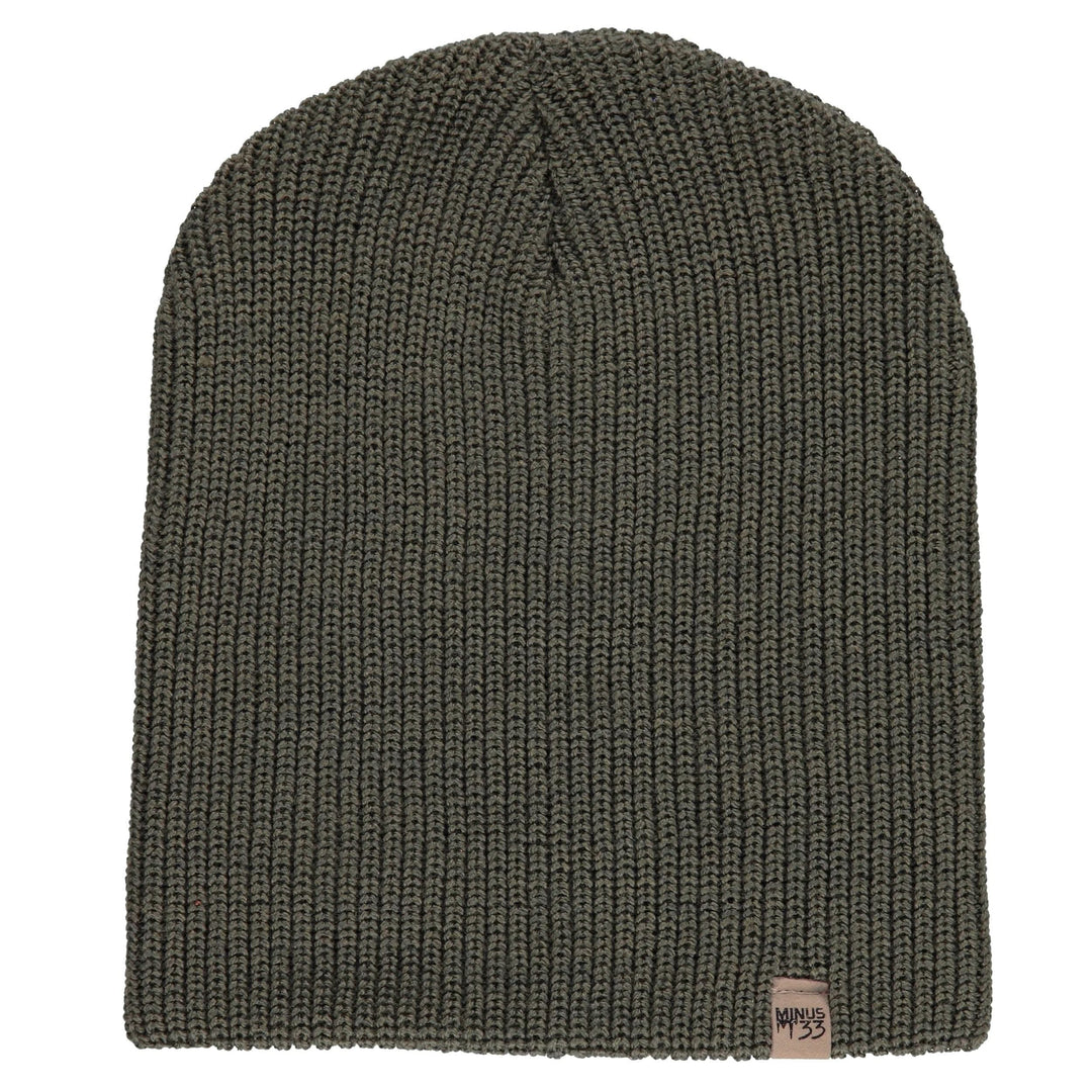 Front flat-lay view of an olive drab green midweight merino wool beanie with vertical rib-knit texture, a rounded crown, and a small Minus33 logo tab at the lower edge 