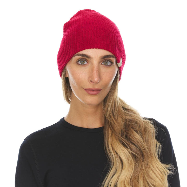 A woman models the midweight hundred percent merino wool beanie, front view 