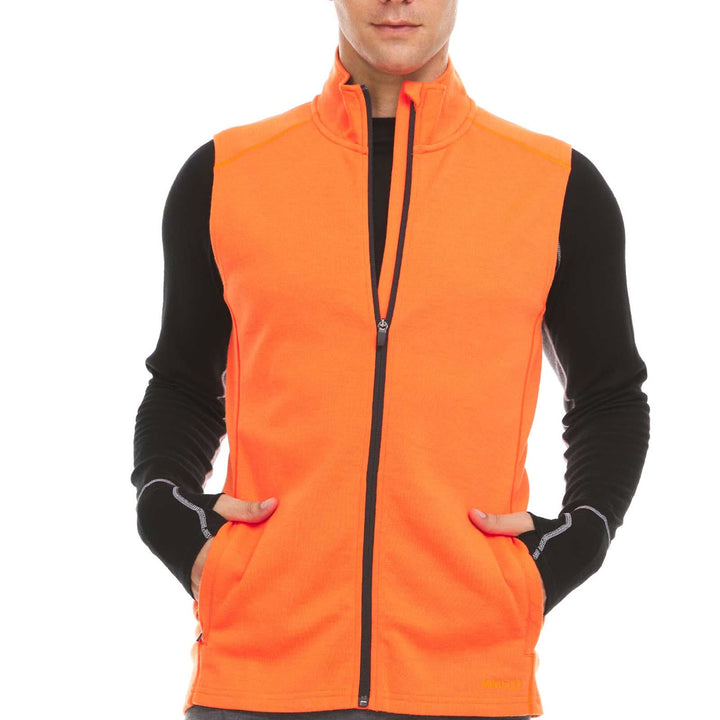 A man models the heavyweight merino wool full-zip vest, front view 