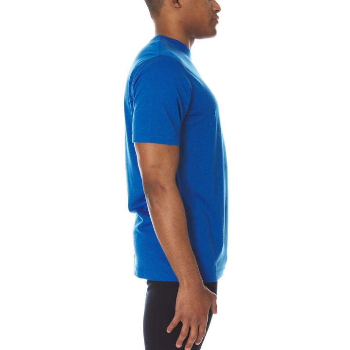 A man models a super soft, short sleeved merino wool t shirt. Use it as a base layer under your work shirt, or wear it all by itself during your next summer summit, right-facing side view 