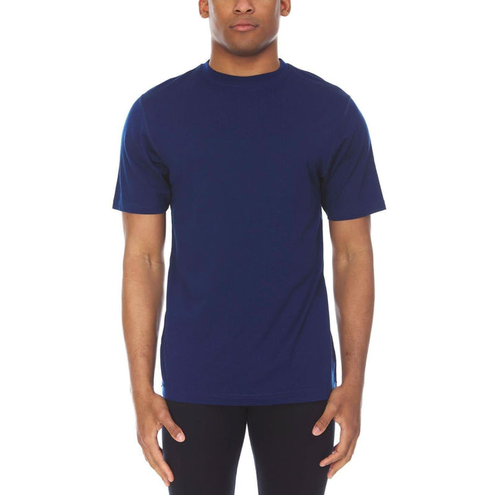 A man models a super soft, short sleeved merino wool t shirt. Use it as a base layer under your work shirt, or wear it all by itself during your next summer summit, front view 