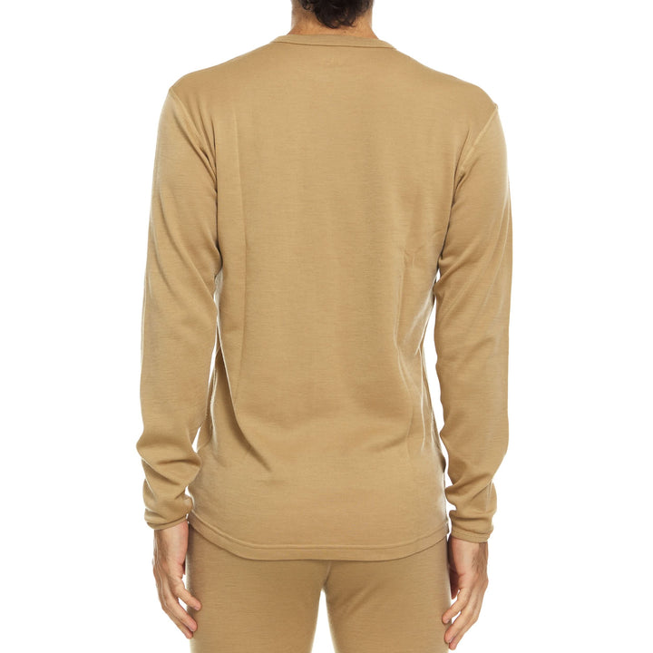 A man models a super soft, long sleeved merino wool thermal base layer crew. This top makes for a perfect first layer on a winter hike, or a nice casual wear on the chilly days of autumn and spring, back view 