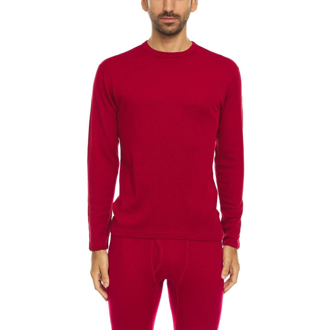 A man models a super soft, long sleeved merino wool thermal base layer crew. This top makes for a perfect first layer on a winter hike, or a nice casual wear on the chilly days of autumn and spring, front view 