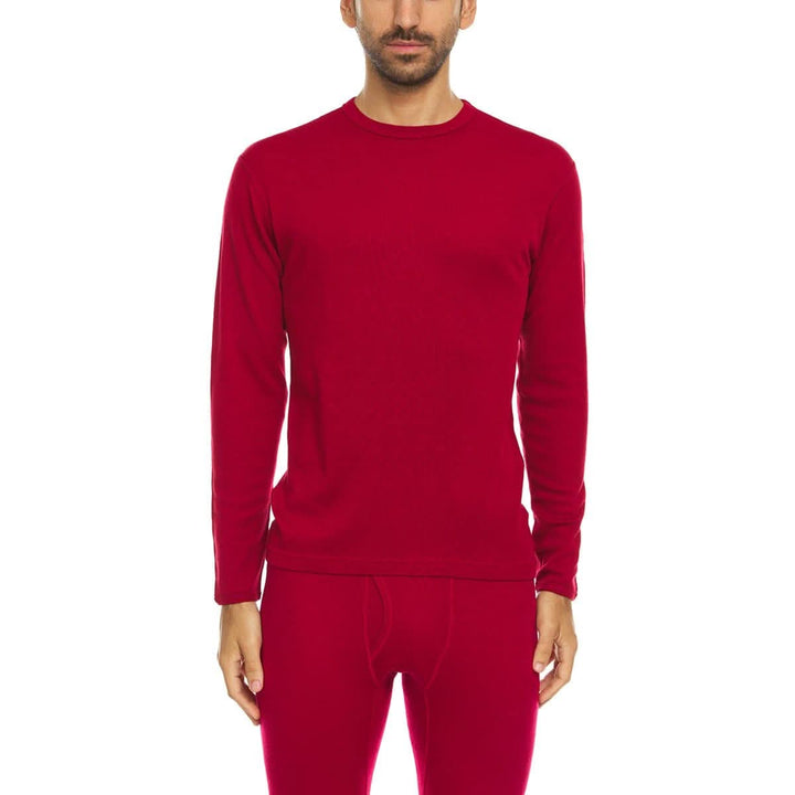 A man models a super soft, long sleeved merino wool thermal base layer crew. This top makes for a perfect first layer on a winter hike, or a nice casual wear on the chilly days of autumn and spring, front view 