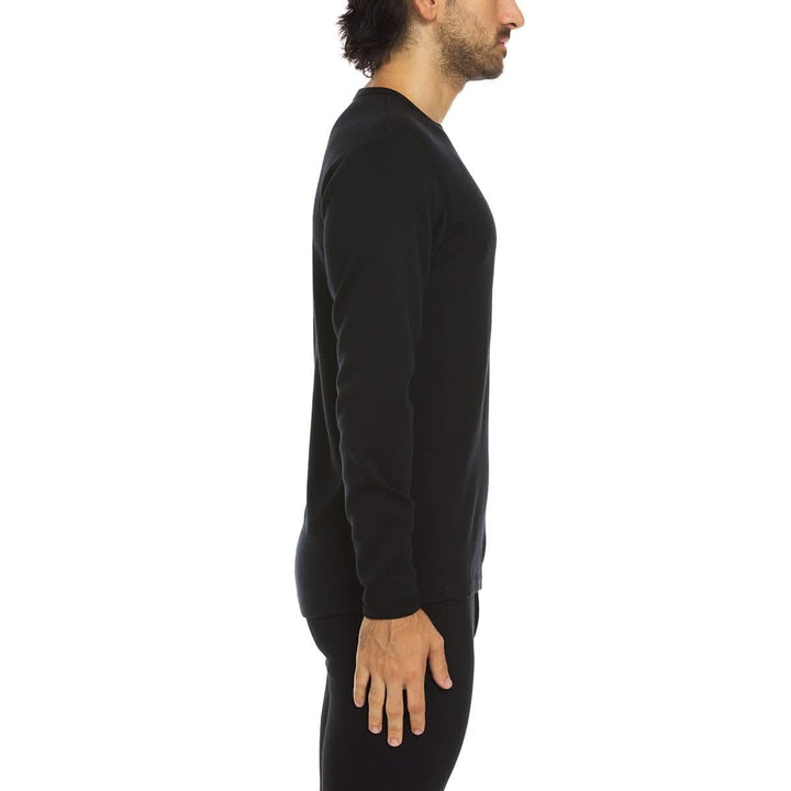 Man wearing a black heavyweight merino crew, side profile 