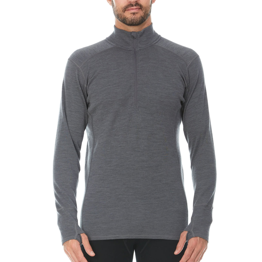 Front view of a man modeling the merino wool charcoal gray midweight quarter zip sweater, complete with flat-lock seams and thumbholes. #color_charcoal-gray