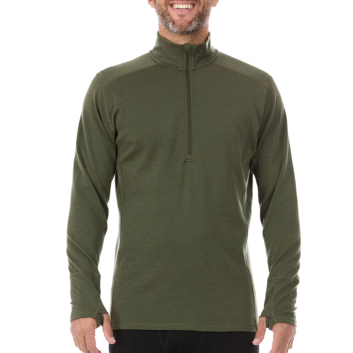 A man models the merino wool midweight quarter zip sweater, complete with flat-lock seams and thumbholes, front view 