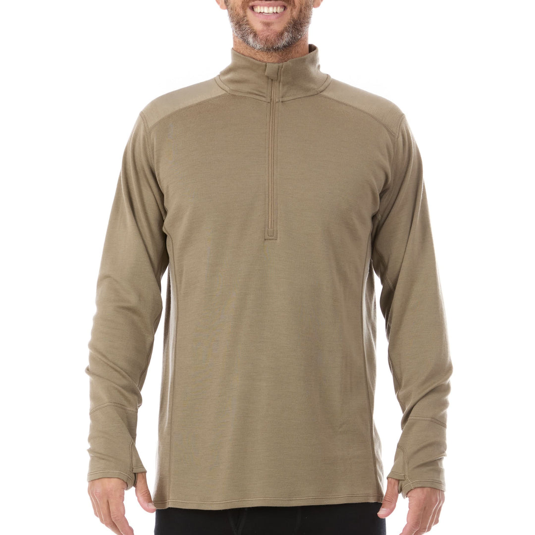 A man models the merino wool midweight quarter zip sweater, complete with flat-lock seams and thumbholes, front view 