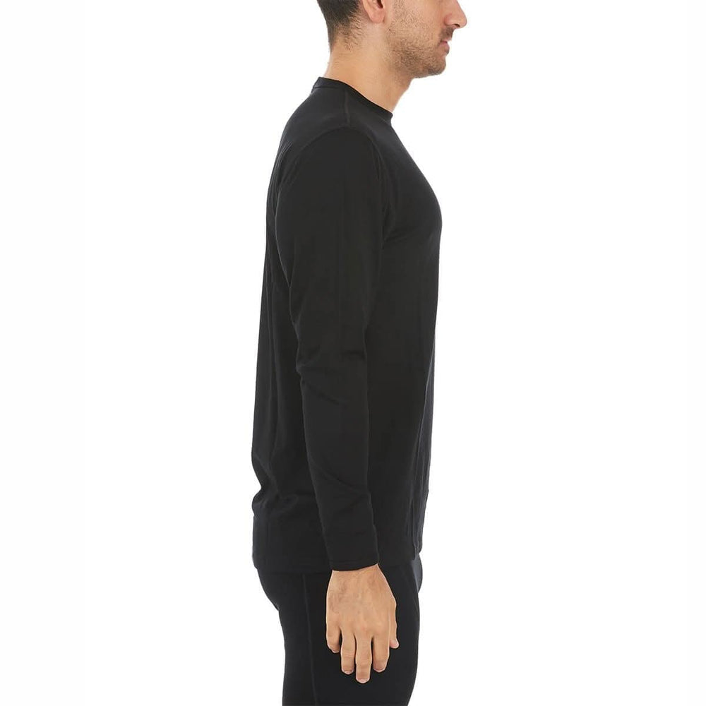 Side view of a man modeling the lightweight long sleeved merino wool base layer crew neck top #color_black