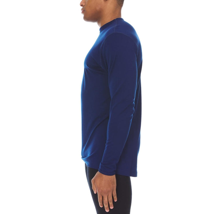 Side view of a male model wearing a navy lightweight long-sleeve merino wool crew top 