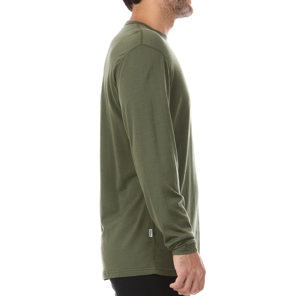 Side view of a man modeling the olive drab lightweight long sleeved merino wool base layer crew neck top #color_olive-drab-green