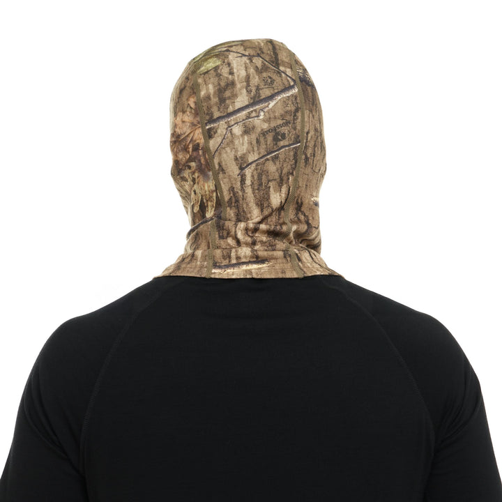 Camouflage merino wool balaclava worn over the face, back view 