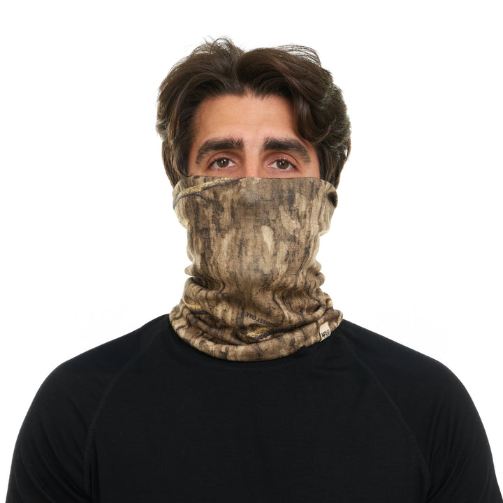 Camouflage merino wool neck gaiter pulled over the face, front view 