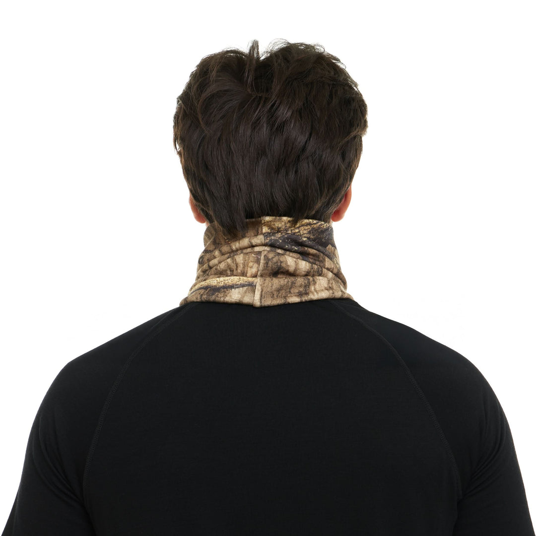 Camouflage merino wool neck gaiter worn lowered around the neck, back view 