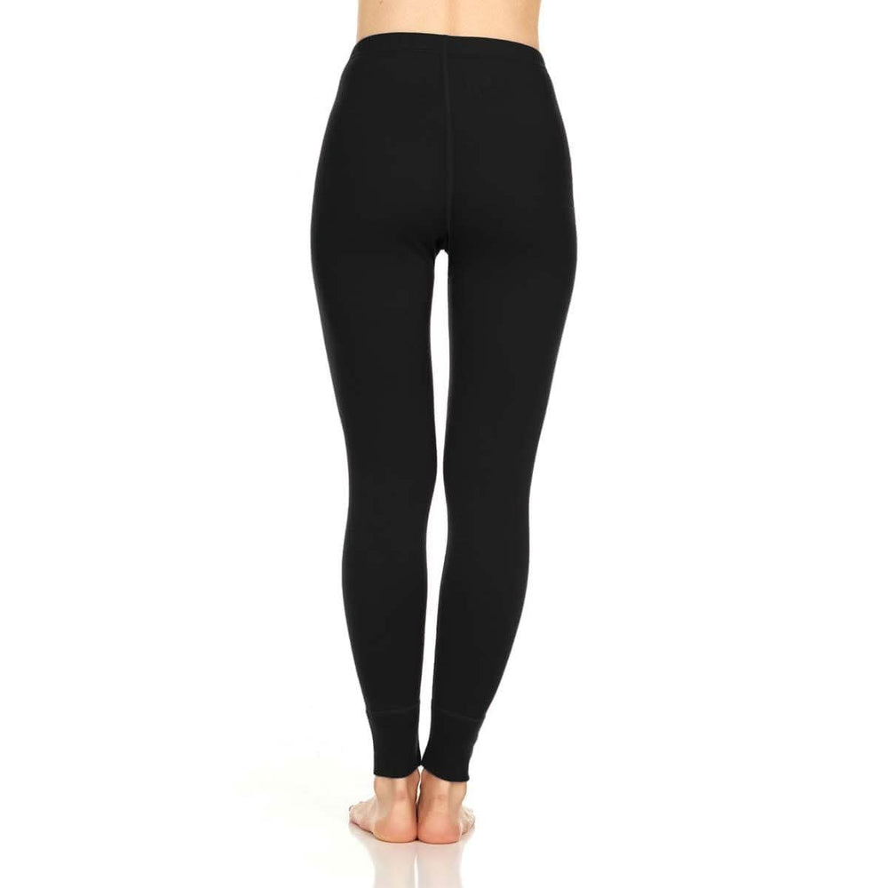 A pair of one hundred percent merino wool lightweight women's base layer bottoms. These bottoms feature a gusset between the legs for improved range of motion, and cuffs around the ankles for comfort and style. Back view. #color_black