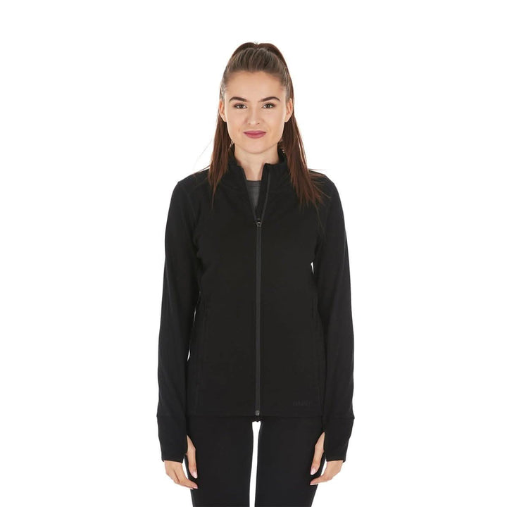 A woman models a hundred percent merino wool heavyweight full zip sweater. This outer layer features a two and a half inch mock neck collar, two zippered pockets, and thumbholes. 