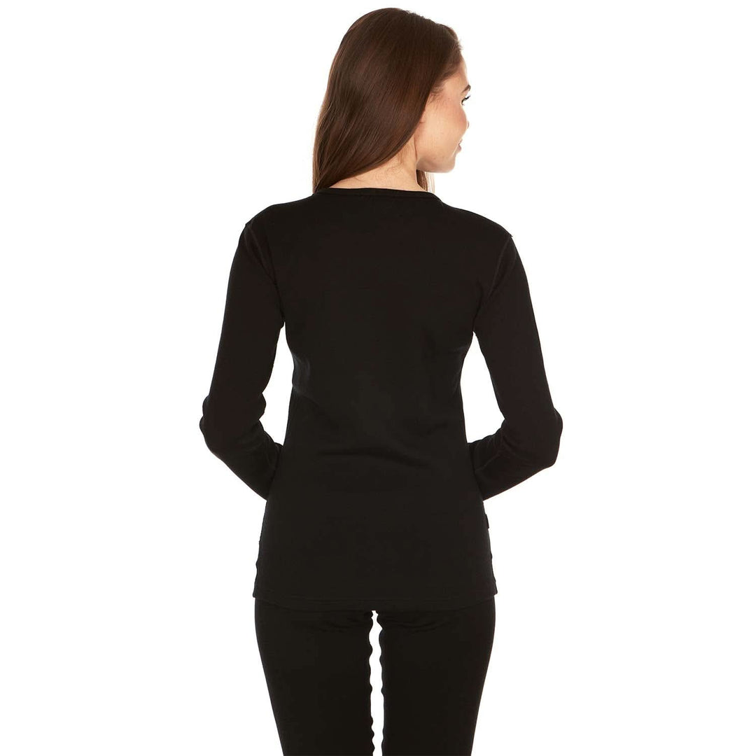 A woman models the one hundred percent merino wool heavyweight women&
