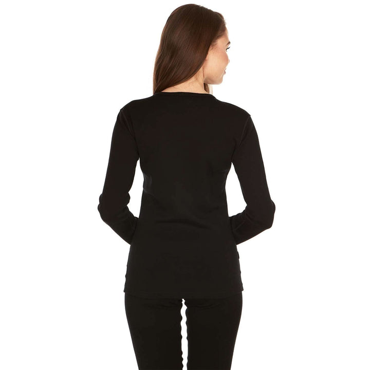 A woman models the one hundred percent merino wool heavyweight women&
