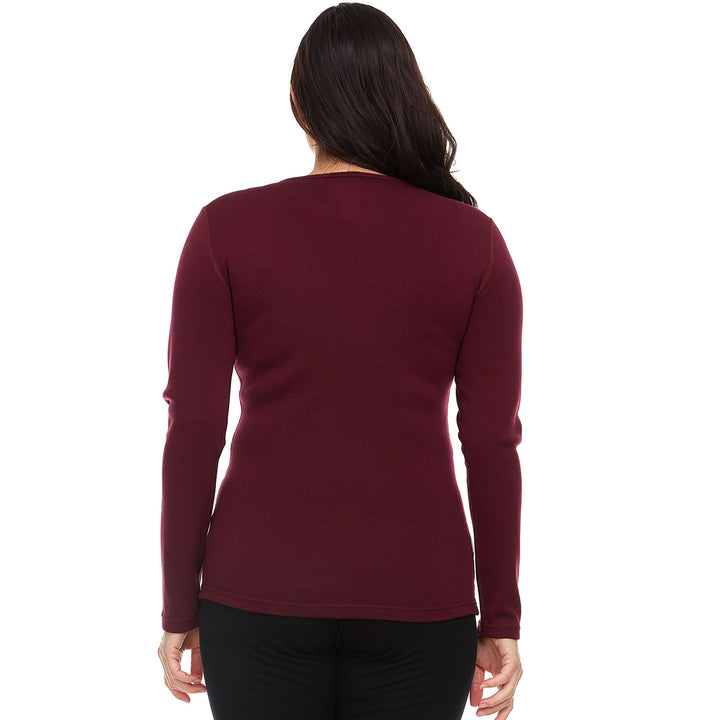 A woman models the one hundred percent merino wool heavyweight women&