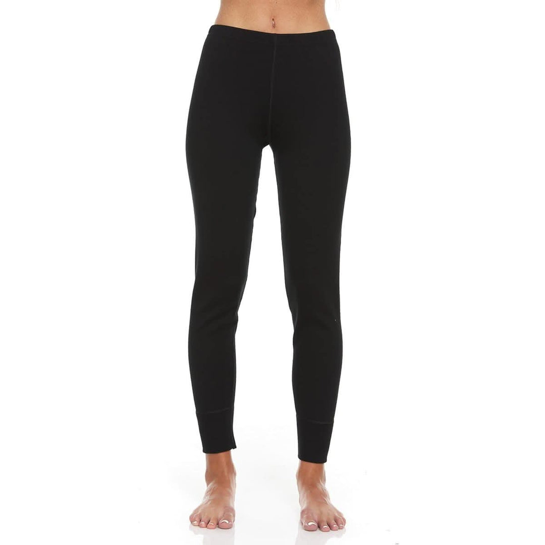A pair of one hundred percent merino wool heavyweight women's base layer bottoms. These bottoms feature a gusset between the legs for improved range of motion, and cuffs around the ankles for comfort and style. Front view. #color_black