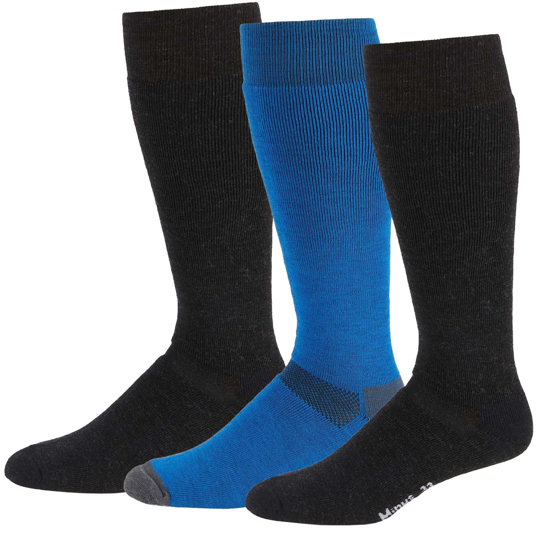 Three pairs of merino wool ski socks in black and blue on a white background