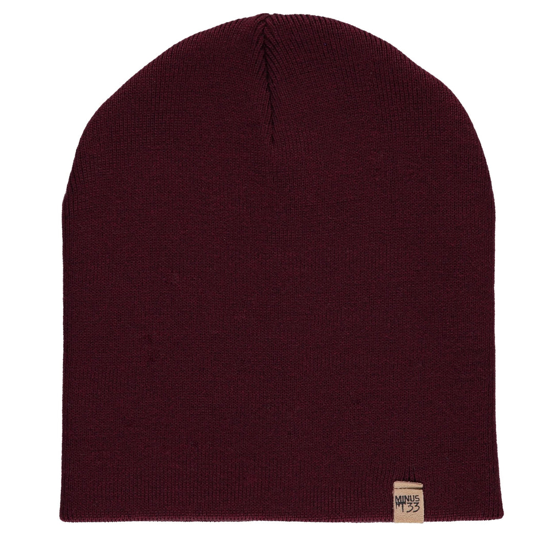 A heavyweight, super soft, one hundred percent merino wool beanie. This heavyweight beanie is the warmest hat that we offer, perfect for hiking through the White Mountains, or sitting at a bonfire in January. 