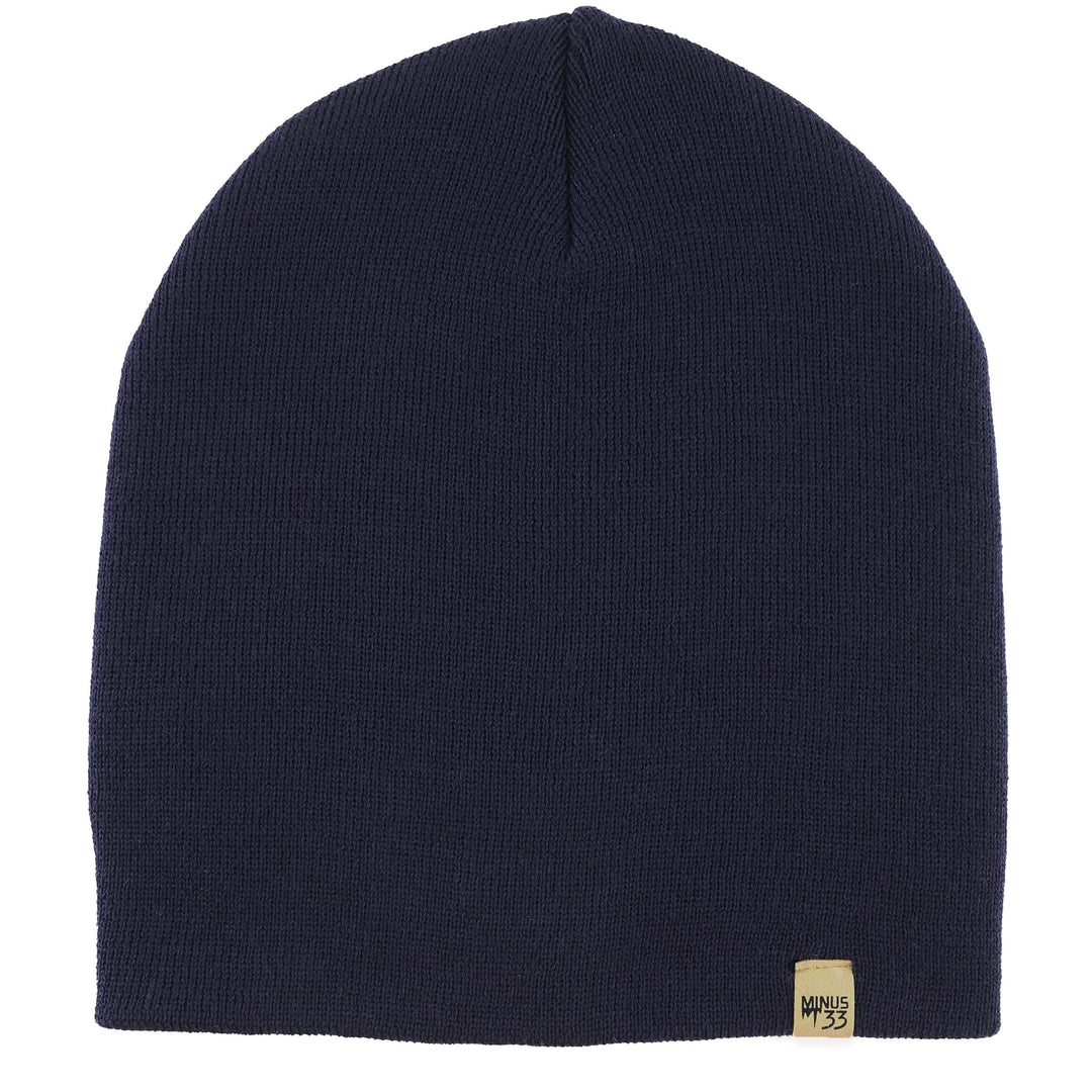 A heavyweight, super soft, one hundred percent merino wool beanie. This heavyweight beanie is the warmest hat that we offer, perfect for hiking through the White Mountains, or sitting at a bonfire in January. 