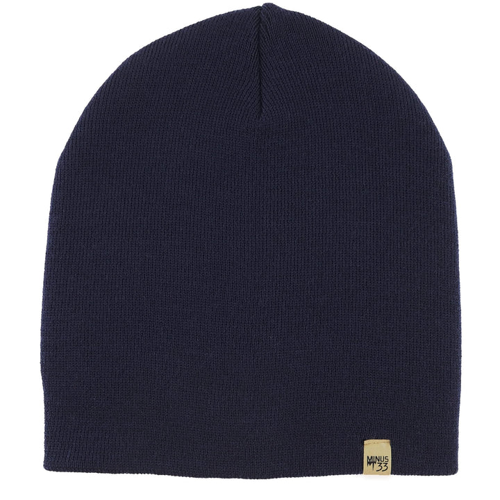 A heavyweight, super soft, one hundred percent merino wool beanie. This heavyweight beanie is the warmest hat that we offer, perfect for hiking through the White Mountains, or sitting at a bonfire in January. 