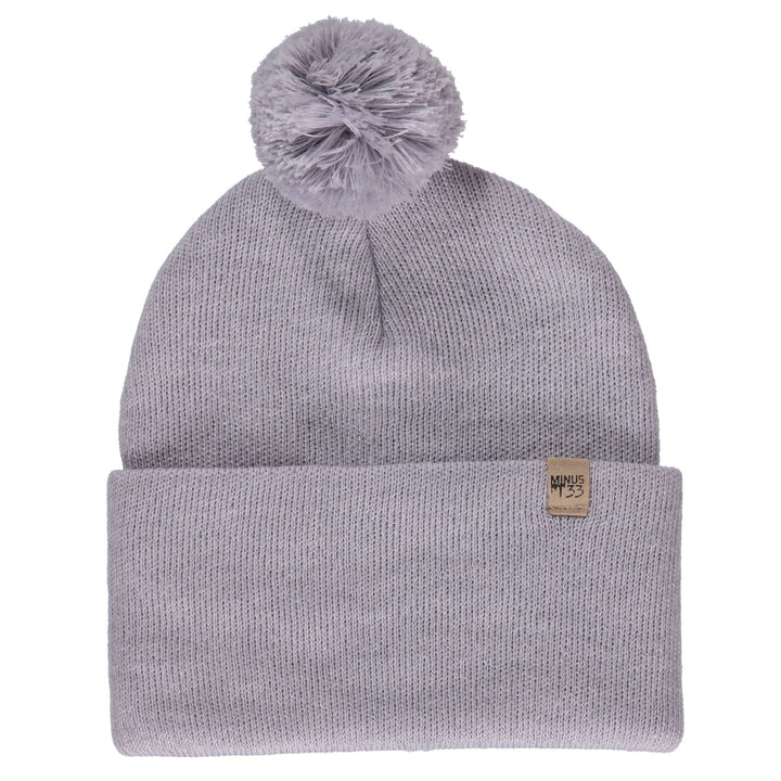 Midweight - Everyday Knit Cuff Pom Beanie 100% Merino Wool.Like our Cuff beanie and made with 100% merino wool, this pom beanie is going to give you the perfect look this winter! Warm and stylish, wear this hat to keep warm whether you’re ice fishing, ice skating, or finishing a long day on the mountain. The activities are endless! This beanie is here to keep you warm during the coldest months, front view 