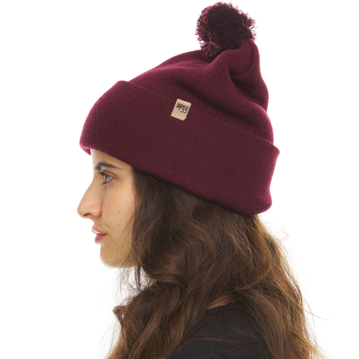 Midweight - Everyday Knit Cuff Pom Beanie 100% Merino Wool. warm beanie for winter, right-facing side view of the cuffed pom beanie 