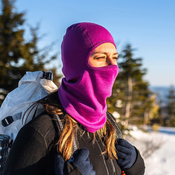 Detailed view of a red-violet midweight 100% merino wool balaclava