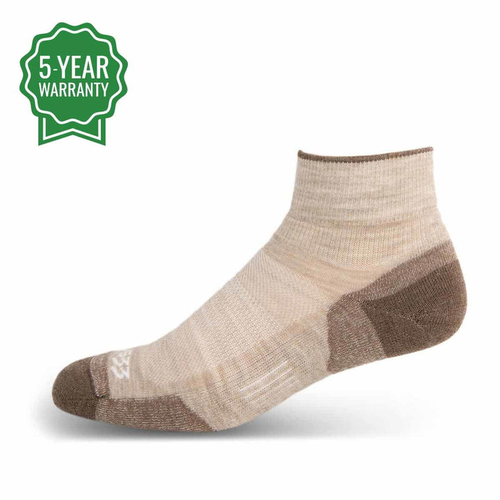 Mountain Heritage Micro Weight Full Cushion Ankle Socks Oatmeal. With over the ankle coverage, the Mountain Heritage Micro Weight Full Cushion Ankle Socks are everything you look for in a low profile wool sock. Fitted with a Y-heel style that provides a perfect pocket for your heel, and 3-Zone Elastic technology, this sock will stay snug on your feet. While keeping dirt and grime at bay, your feet will stay aired out and cool due to the venting technology fixated on the top of the sock. 