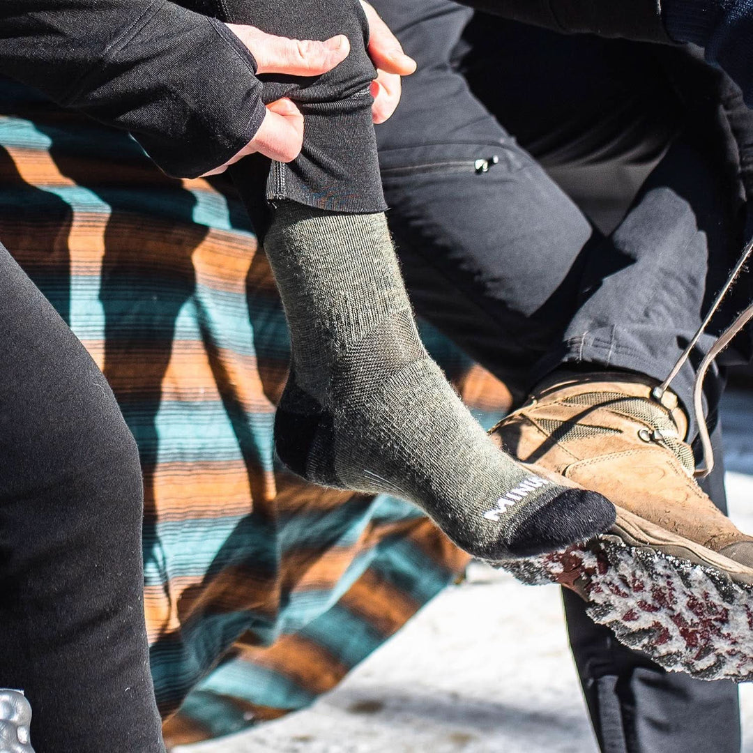 NH USA Made Merino Wool crew socks. Best all season lightweight merino wool crew socks, close-up of sock worn beside a hiking boot 