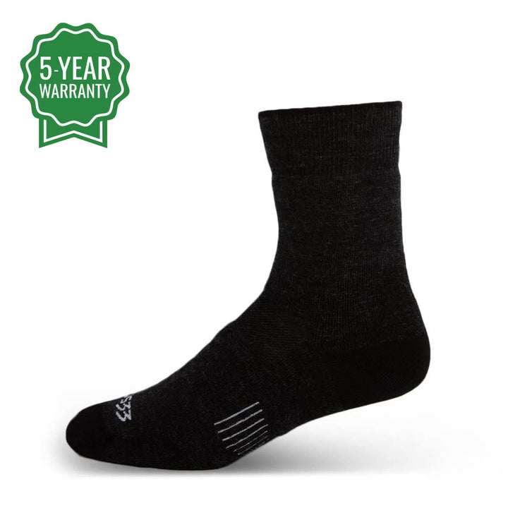 Side view of black lightweight cushioned merino wool crew socks arranged on a white background, showing ribbed cuffs, supportive ankle panels, shaped heels, padded soles, and rounded toes 