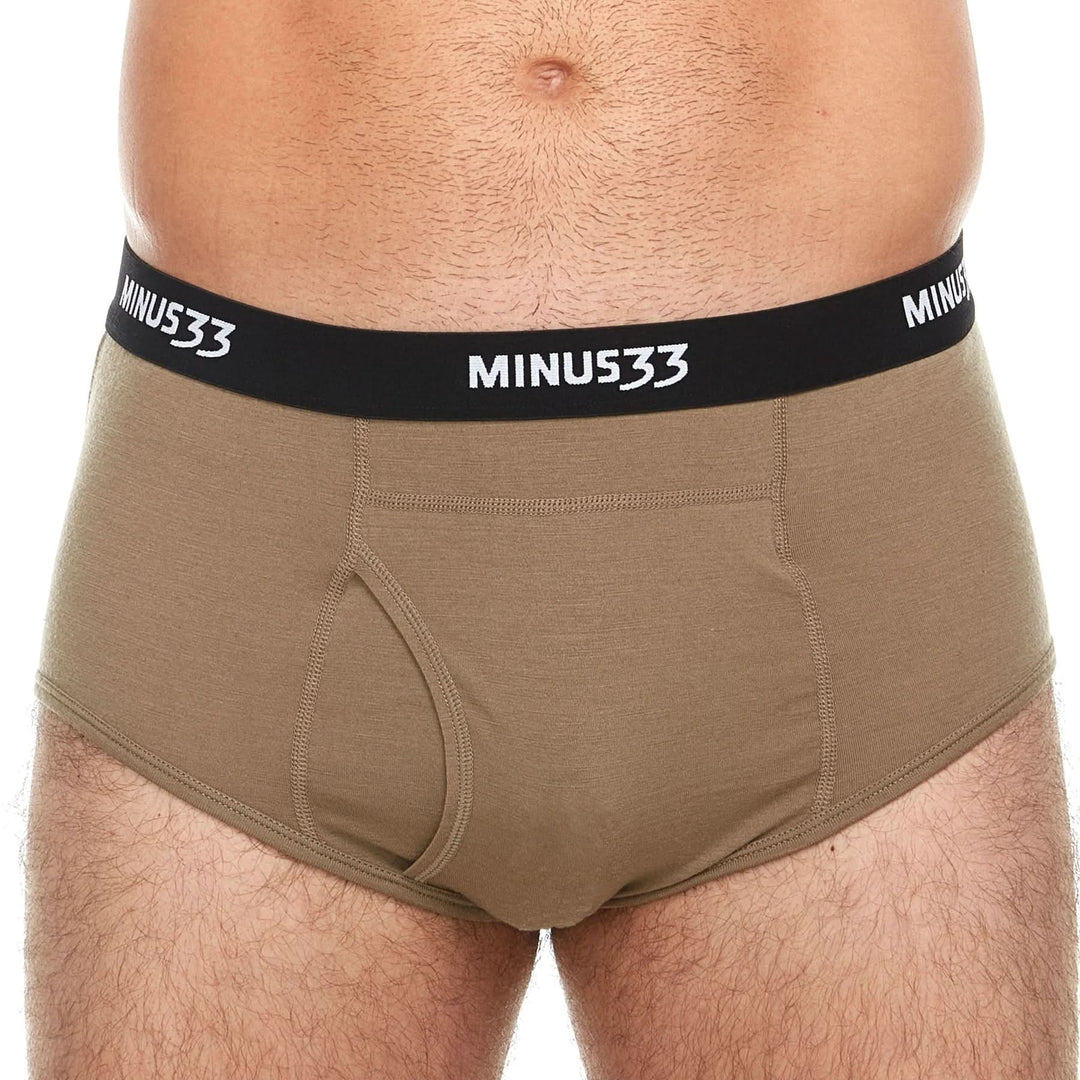 Flat front view of tan Woolverino micro weight merino wool boxer briefs on a white background, showing the wide waistband, contoured pouch, flat seams, fitted legs, and smooth hem openings #color_tan-499