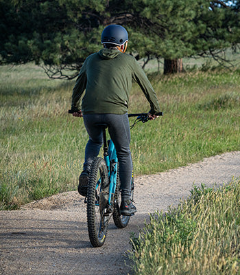 man biking wearing midweight woolverino running tights