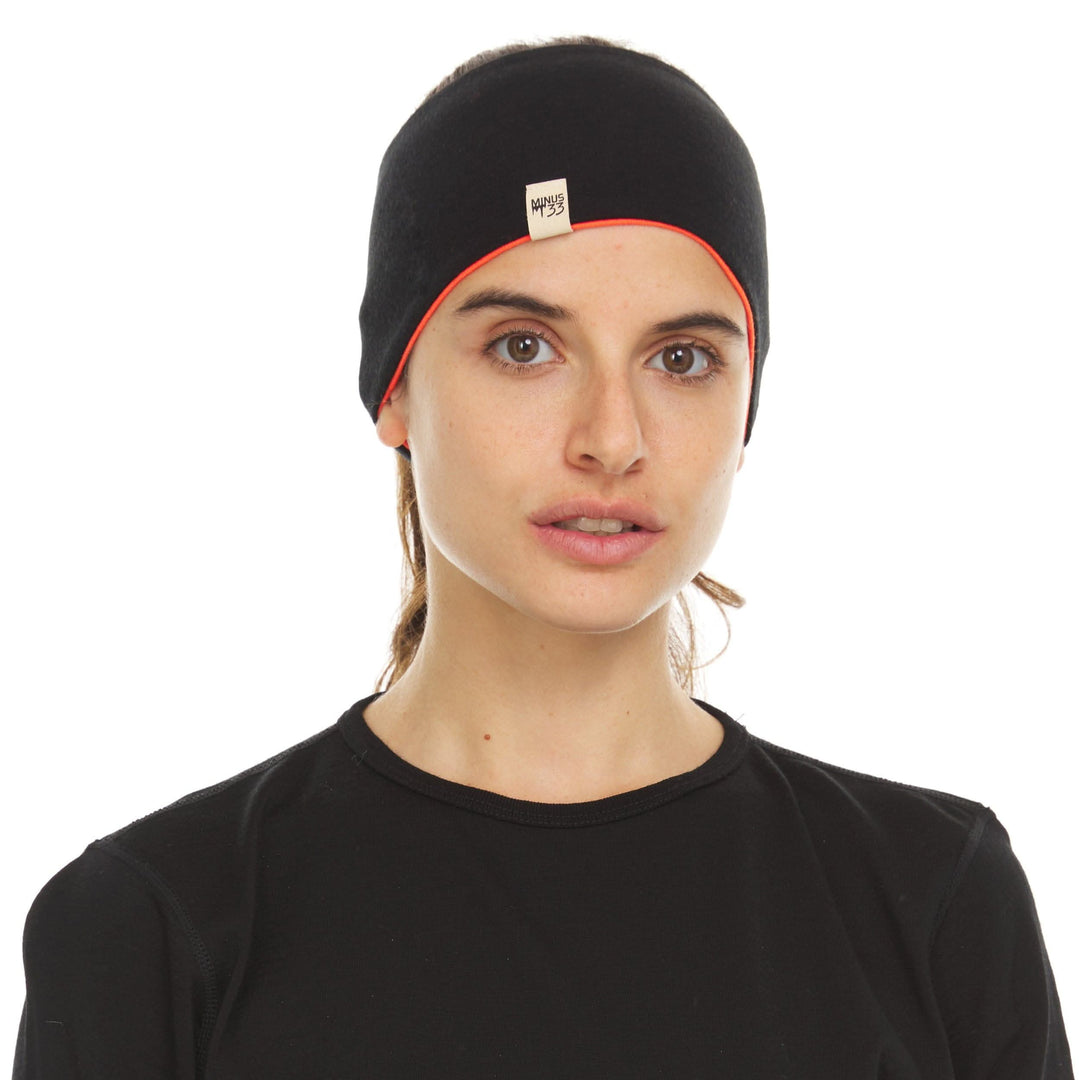 Minus33 Merino Wool Clothing Midweight Wool Reversible Headband, front view outdoors 