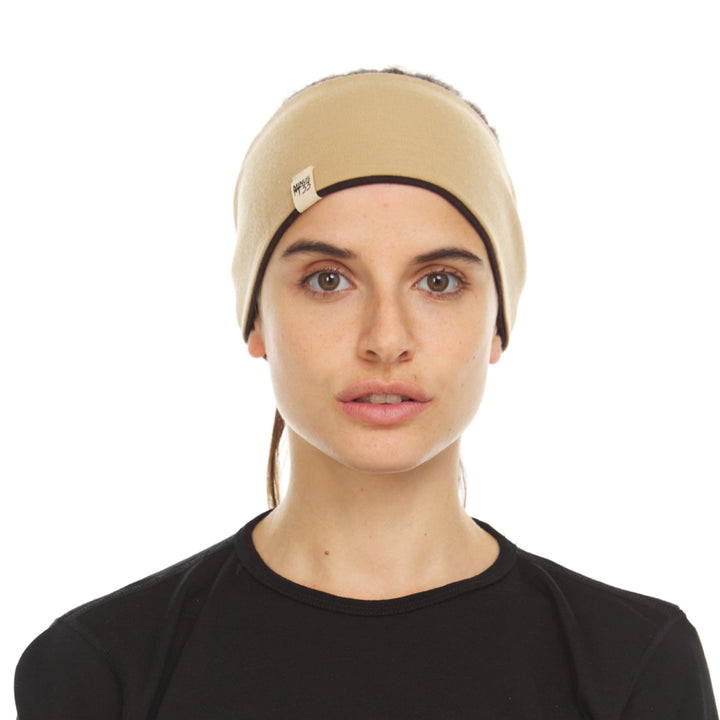 Minus33 Merino Wool Clothing Midweight Wool Reversible Headband, front view outdoors 