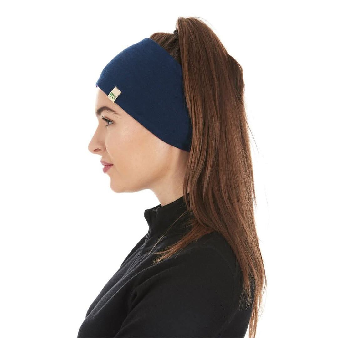 Minus33 Merino Wool Clothing Midweight Wool Reversible Headband, close-up of the product with arms relaxed 