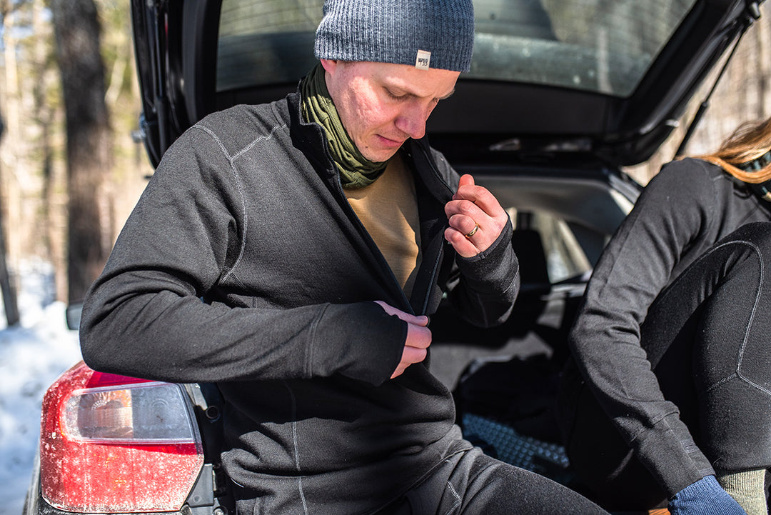 Man Wearing Merino Wool Wilderness Expedition1/4 zip